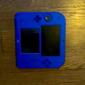 Blue 2ds With Charger and Built in Mario Kart.